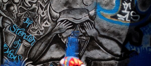 Un grafiti Un grafiti - Sputnik Mundo