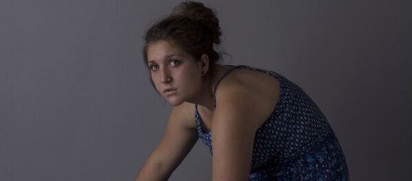 Una mujer - Sputnik Mundo