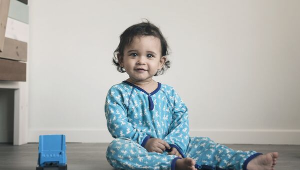 Un bebé Un bebé - Sputnik Mundo