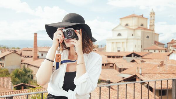 Una turista - Sputnik Mundo