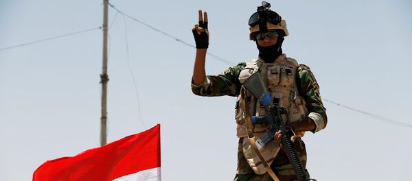 Soldado de las Fuerzas Armadas de Irak Soldado de las Fuerzas Armadas de Irak - Sputnik Mundo