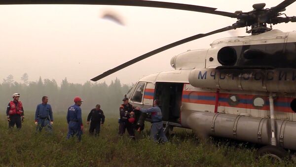 Equipos de socorro se dirigen al lugar del accidente del Il-76 ruso - Sputnik Mundo