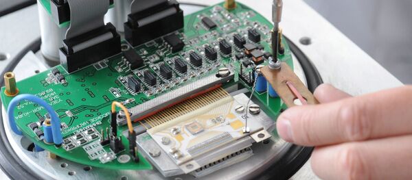 Montaje de un aparato cósmico - Sputnik Mundo