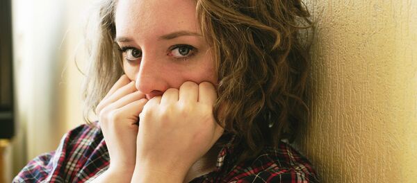 Una mujer - Sputnik Mundo