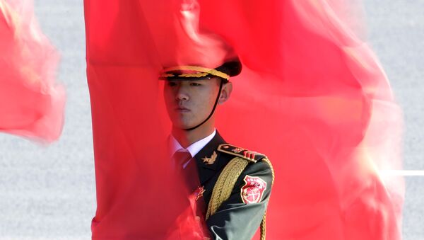 Un militar chino - Sputnik Mundo