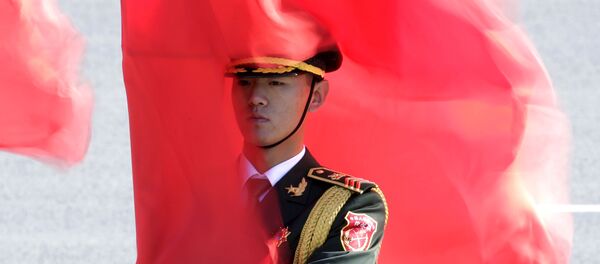 Un militar chino - Sputnik Mundo