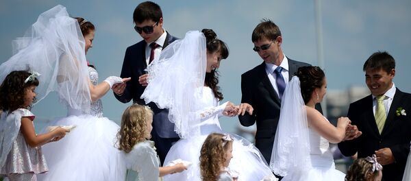 Un boda masiva (archivo) - Sputnik Mundo