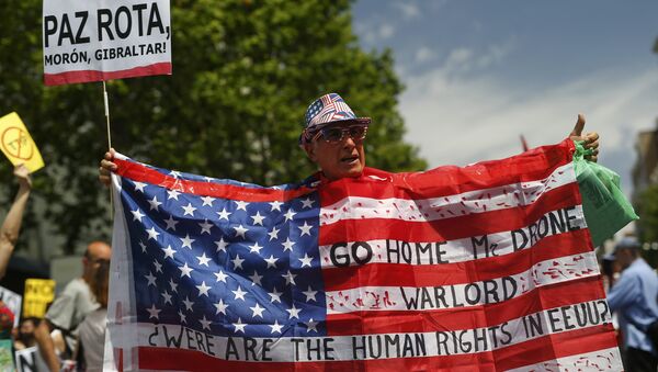 Protestas contra la presencia de Barack obama, presidente estadounidense, en Madrid, España - Sputnik Mundo