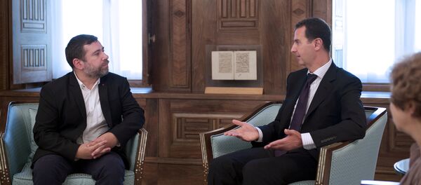 Presidente de Siria, Bashar Asad, durante una reunión en Damasco con una delegación liderada por el eurodiputado Javier Couso - Sputnik Mundo