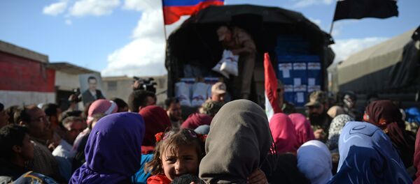Entrega de ayuda humanitaria rusa en Siria (Archivo) - Sputnik Mundo