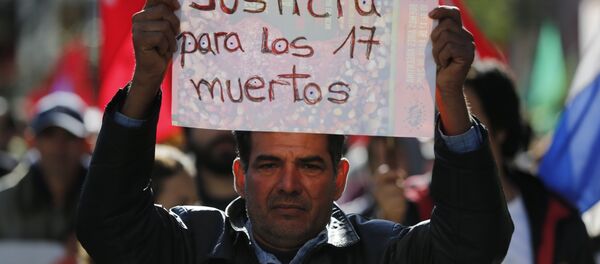 El hombre en la marcha en Asunción, Paraguay - Sputnik Mundo