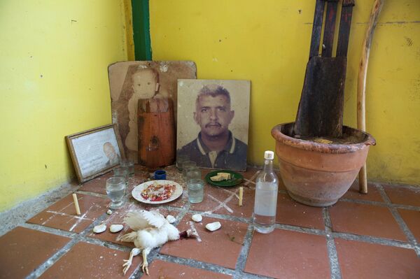 'El rincón rojo', en la casa de un adepto en Caracas - Sputnik Mundo