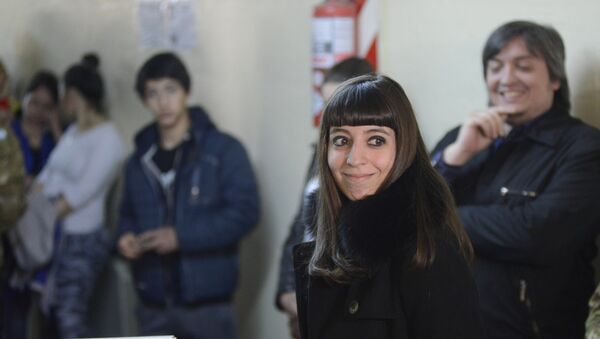 Florencia Kirchner, daughter of Argentina's President Cristina Fernandez, casts her vote during elections in Rio Gallegos, Argentina, Sunday, Oct. 25, 2015 - Sputnik Mundo