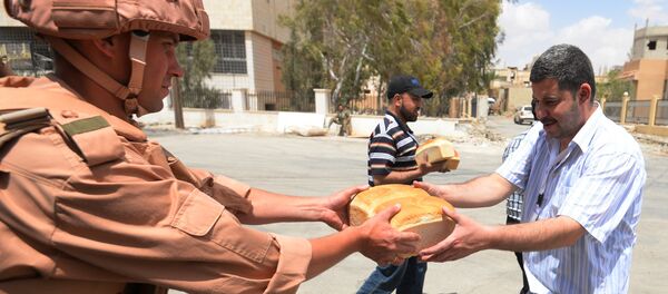 Entrega de ayuda humanitaria rusa en Alepo (archivo) Entrega de ayuda humanitaria rusa en Alepo (archivo) - Sputnik Mundo
