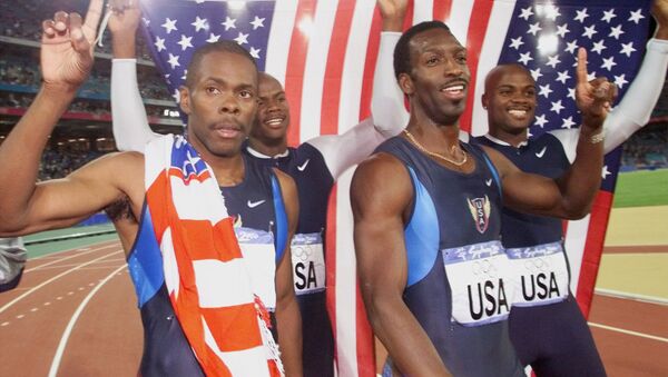 Campeones olímpicos de Sidney 2000 en la carrera de relevos de 4×400 metros. Antonio Pettigrew, Calvin Harrison, Michael Johnson and Alvin Harrison. - Sputnik Mundo