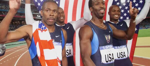 Campeones olímpicos de Sidney 2000 en la carrera de relevos de 4×400 metros. Antonio Pettigrew, Calvin Harrison, Michael Johnson and Alvin Harrison. - Sputnik Mundo