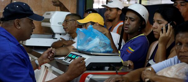 Una tienda municipal en Caracas Una tienda municipal en Caracas - Sputnik Mundo