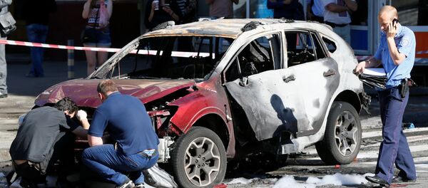 El coche del periodista ruso Pável Sheremet El coche del periodista ruso Pável Sheremet - Sputnik Mundo