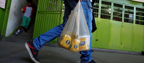 Un venezolano en Caracas (archivo) - Sputnik Mundo