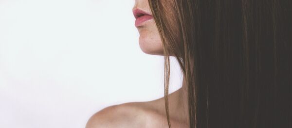 Una mujer (Archivo) - Sputnik Mundo