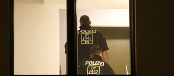 Policías en el edificio cerca del lugar del tiroteo en Múnich - Sputnik Mundo
