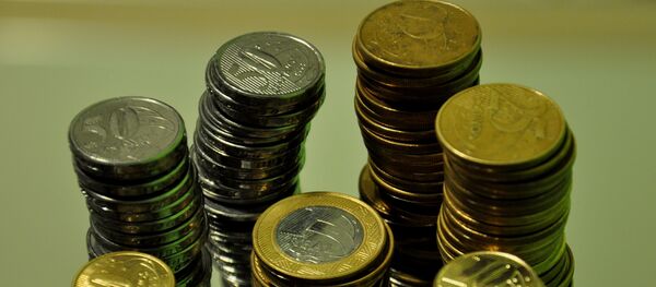 Monedas de reales brasileños (imagen referencial) - Sputnik Mundo