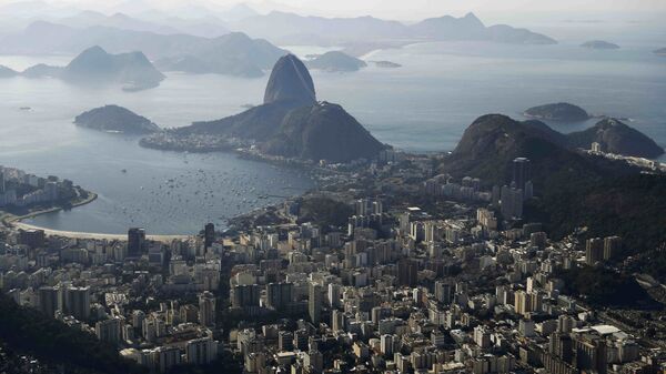 A view of the city from the Christ the Redeemer statue on the first day of a massive security operation that the government says will last through the end of the Rio 2016 Olympic Games, in Rio de Janeiro, Brazil, July 24, 2016. - Sputnik Mundo