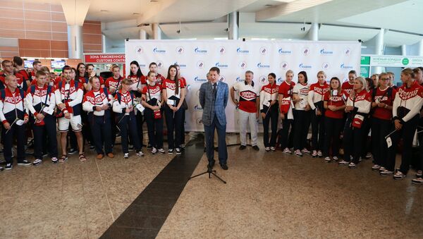 La primera delegación olímpica de Rusia parte a Río de Janeiro - Sputnik Mundo