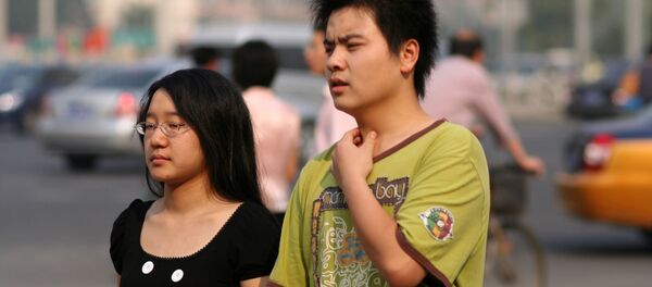 Una pareja china - Sputnik Mundo