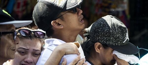 El funeral de una de las víctimas de la lucha contra los narcotraficantes en Filipinas El funeral de una de las víctimas de la lucha contra los narcotraficantes en Filipinas - Sputnik Mundo