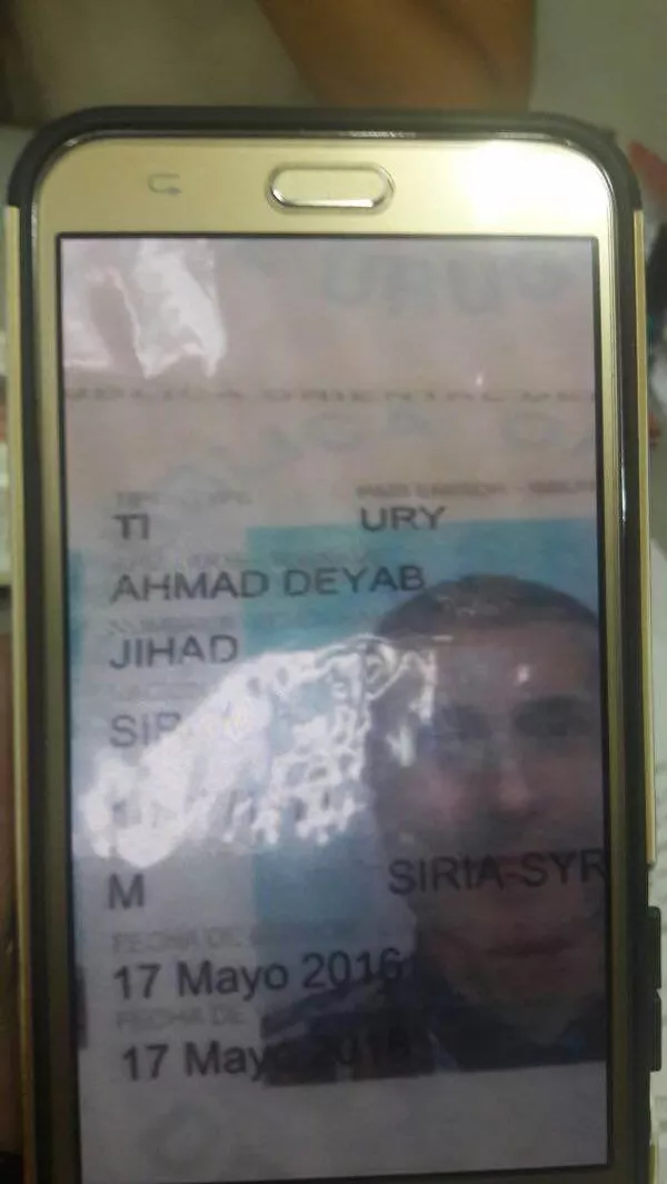Imagen del documento de viaje expedido por el Gobierno de Uruguay a nombre de Jihad Ahmad Deyab Imagen del documento de viaje expedido por el Gobierno de Uruguay a nombre de Jihad Ahmad Deyab - Sputnik Mundo