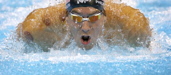 El nadador estadounidense Michael Phelps durante la semifinal de los 200 metros mariposa en los JJOO 2016 - Sputnik Mundo
