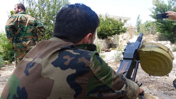 El Ejército sirio durante los combates en Latakia - Sputnik Mundo