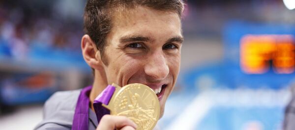 Michael Phelps, nadador estadounidense, durante los JJOO de 2012 en Londres - Sputnik Mundo