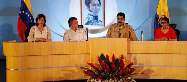 María Ángela Holguín, Juan Manuel Santos, Nicolás Maduro y Delcy Rodríguez - Sputnik Mundo