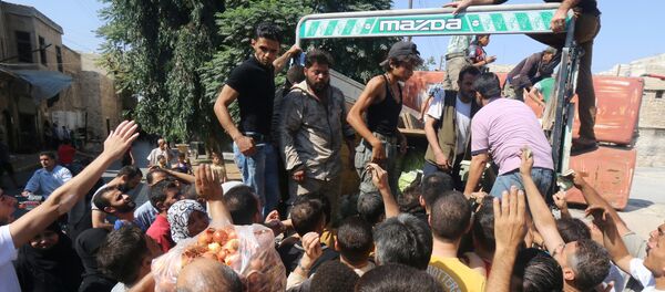 La ayuda humanitaria para los residentes de Alepo - Sputnik Mundo