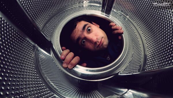 Una lavadora - Sputnik Mundo