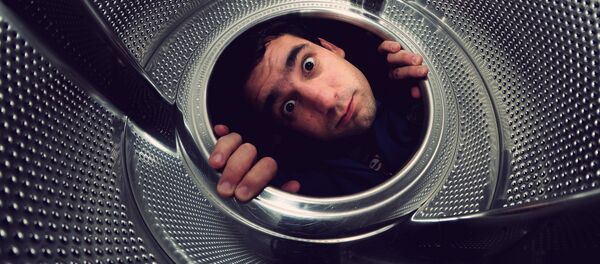 Una lavadora - Sputnik Mundo