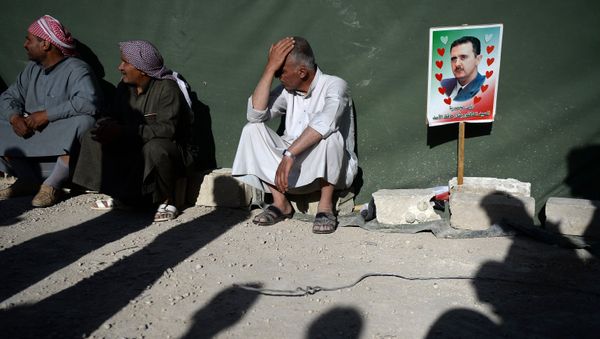 Partidarios de Bashar Asad en Siria Partidarios de Bashar Asad en Siria - Sputnik Mundo
