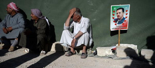 Partidarios de Bashar Asad en Siria Partidarios de Bashar Asad en Siria - Sputnik Mundo