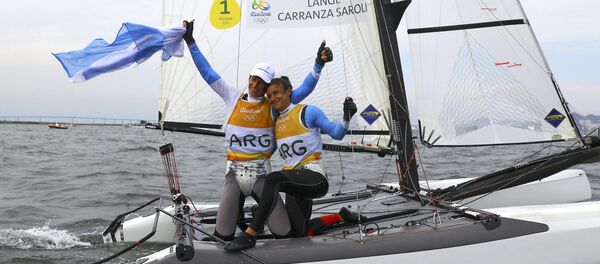 Argentinos Santiago Lange y Cecilia Carranza ganaron el oro en la regata de la clase Nacra 17 mixto en los Juegos Olímpicos de Río 2016 - Sputnik Mundo