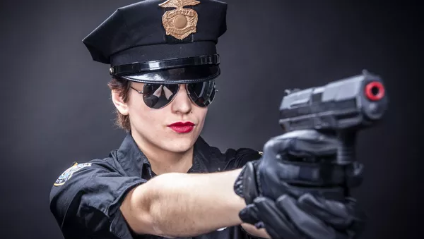 Una mujer policía - Sputnik Mundo