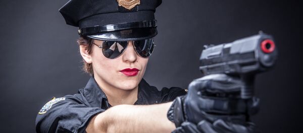 Una mujer policía - Sputnik Mundo