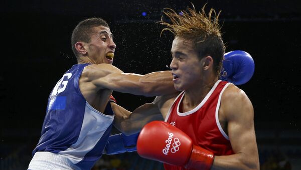 Mohamed Flissi y Yoel Finol - Sputnik Mundo