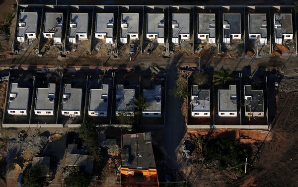 Las casas de los residentes que se negaron a irse de Vila Autódromo Las casas de los residentes que se negaron a irse de Vila Autódromo - Sputnik Mundo