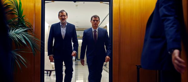 Presidente del Gobierno en funciones y candidato oficial a la investidura, Mariano Rajoy y presidente de Ciudadanos, Albert Rivera - Sputnik Mundo