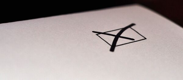 Una votación - Sputnik Mundo