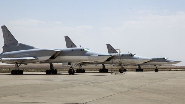 In this photo taken on Monday, Aug. 15, 2016, A Russian Tu-22M3 bomber stands on the tarmac at an air base near Hamedan, Iran. - Sputnik Mundo