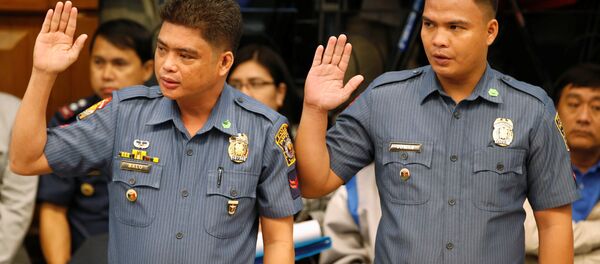La policía filipina - Sputnik Mundo