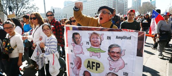 Una protesta en Chile - Sputnik Mundo